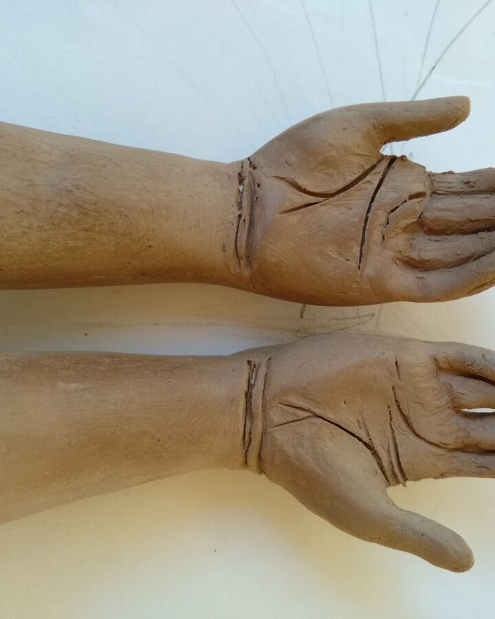The Giving Hands Clay Sculpture Pair