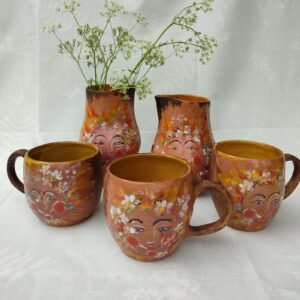 Earth Spirit Floral Face Pottery Collection